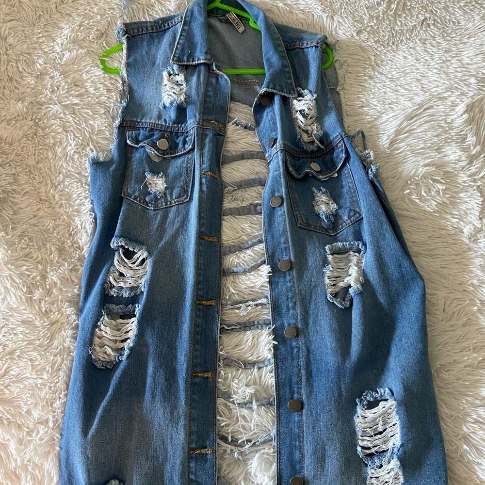 Long ripped back jean jacket. OS
